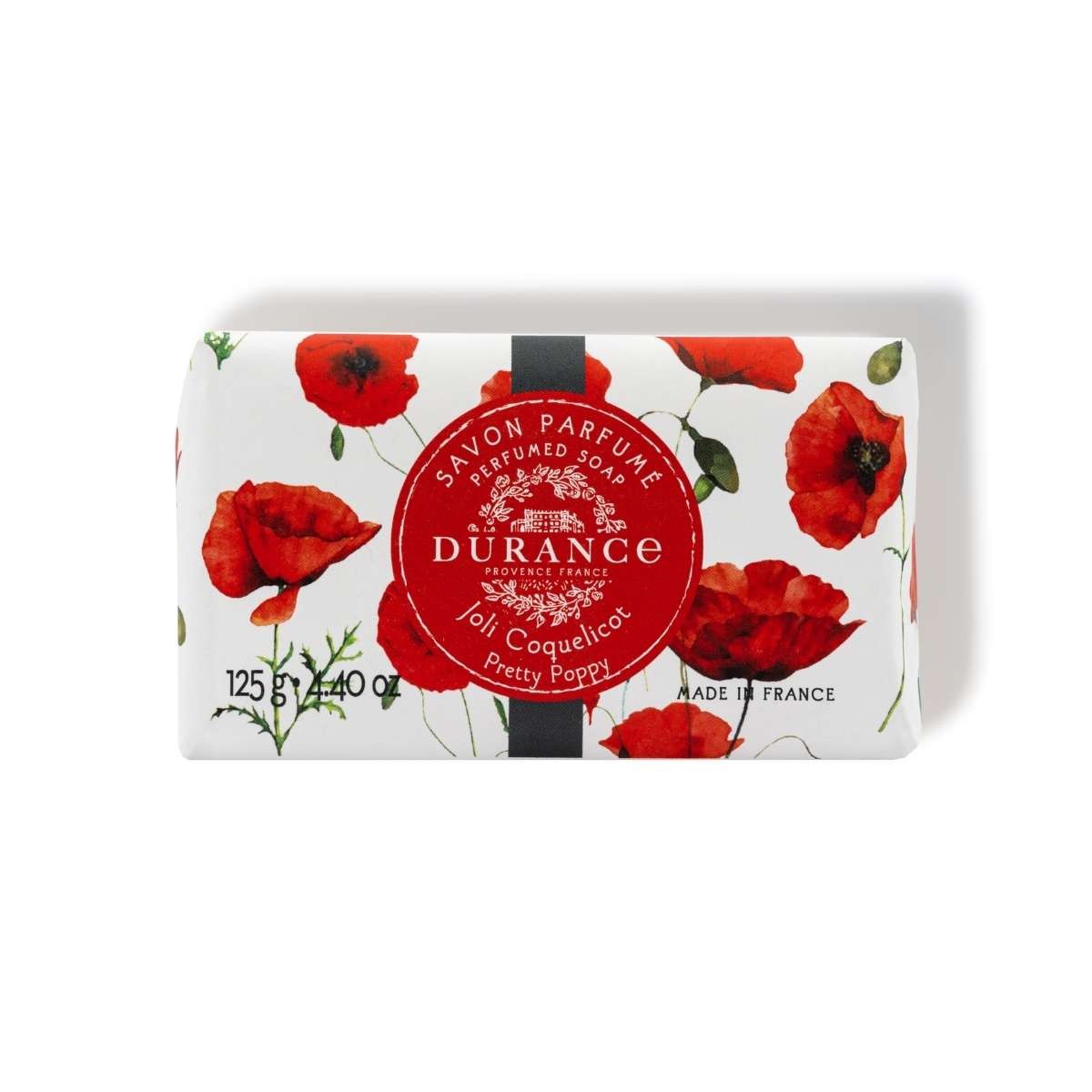 A bar of Durance perfumed Pretty Poppy Soap with a floral pattern, predominantly red, and a black label in the center.